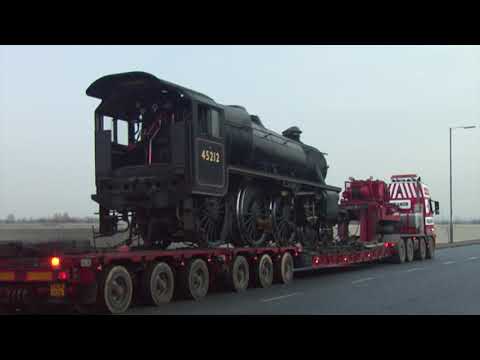 NYMR - LMS Black 5 No 45212 on low loader en route to Grosmont after tyre turning at Thornaby Depot