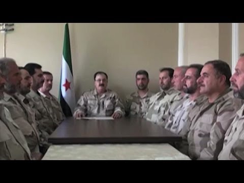 تقرير تلفزيوني لقناة بي سي سي نيوز حول رفض قائد أركان الجيش السوري الحر سليم إدريس قرار إقالته
