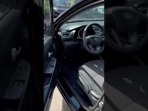 фото kia rio iii 0