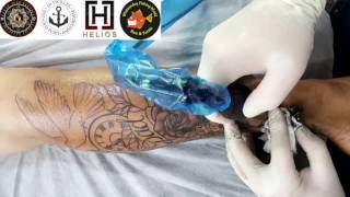 Chris and his father's memorial tattoo