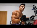 Young muscle guy flexing