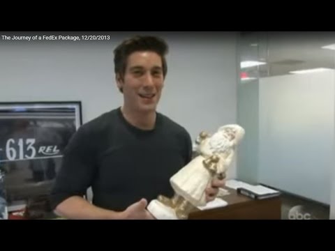 DAVID MUIR, Receives weird fragile Santa, "The Journey of a FedEx Package", 12.20.13