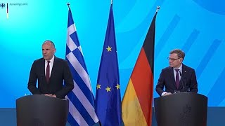 Griechenlands Außenminister in Berlin: Distanzierung vom Iran-Krieg