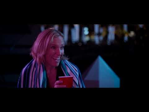 Autumn-night exterior from the trailer, matching the soundtrack’s after-dark drive feel