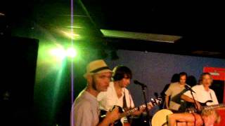 Sam Glass performing shirtless at the Jellyfish at Perdido Key with Reed Lightfoot