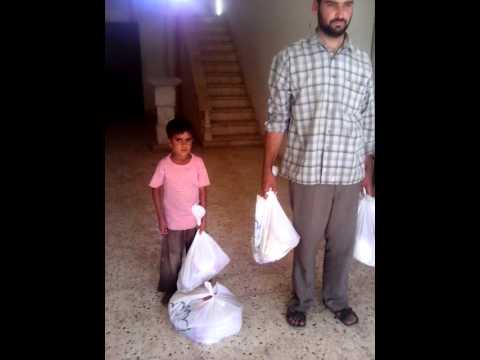 توزيع سلل إغاثية في عنجارة في محافظة حلب من قبل هيئة الشام الإسلامية