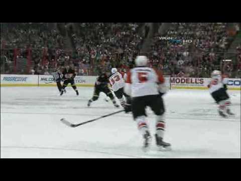 Andrew Ladd Flattens Dan Carcillo 3/13/2010