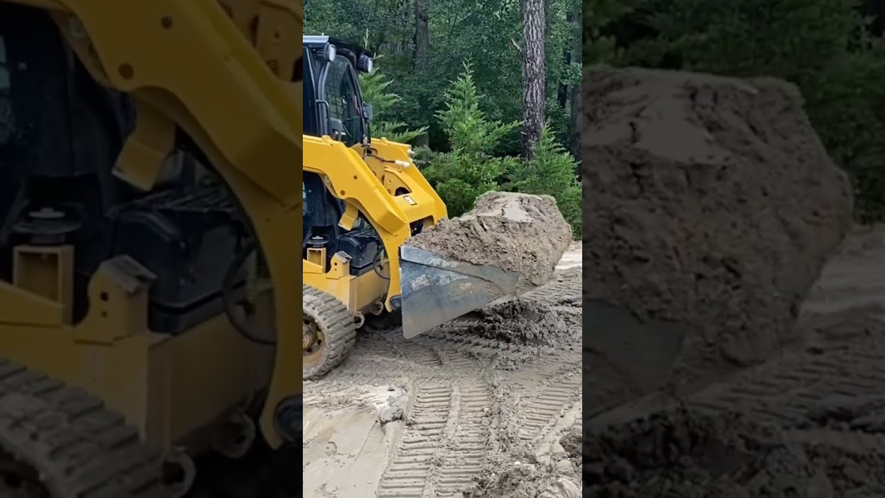 Cat 259d working in the mud