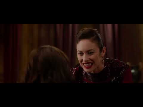 Trailer image: Rose in combat stance as a pop track cuts out for a score sting