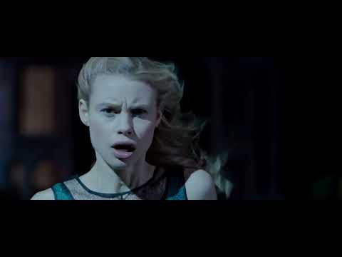 Trailer montage: equinox dance floor, combat practice, and campus at night, all cut to pulsing pop