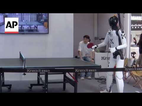 Video Thumbnail: Humanoid robots dance, play table tennis and do laundry at WAIC 2026