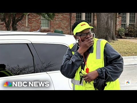 Elementary school 'carpool dads' surprise crossing guard with new car