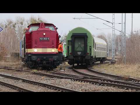 112 302 mit Wagenüberführung in Wittenberg (27.02.2021)