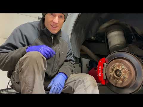 Installing plastic brake covers on a Range Rover Sport L320