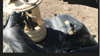 2004 Chrysler Sebring fuel tank pump removal (fuel pump replacement) 1of 2 vid.