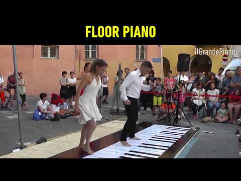 Professionnal dance on giant floor piano