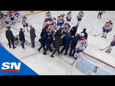 Jake Evans Stretchered Off Ice After Huge Hit From Mark Scheifele Following Empty Net Goal