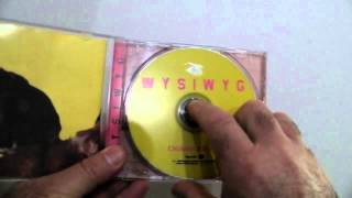 Opening Chumbawamba's 2000 CD album "WYSIWYG"...