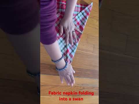 How to fold a simple fabric napkin into a swan