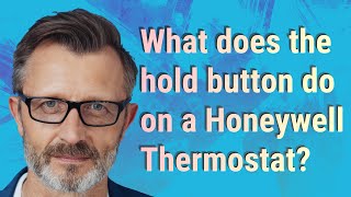 What does the hold button do on a Honeywell Thermostat?