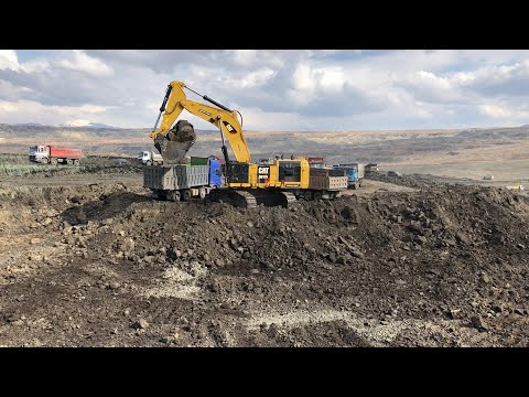 Caterpillar 6015B Excavator Loading Mercedes & MAN Trucks - Sotiriadis Mining Group