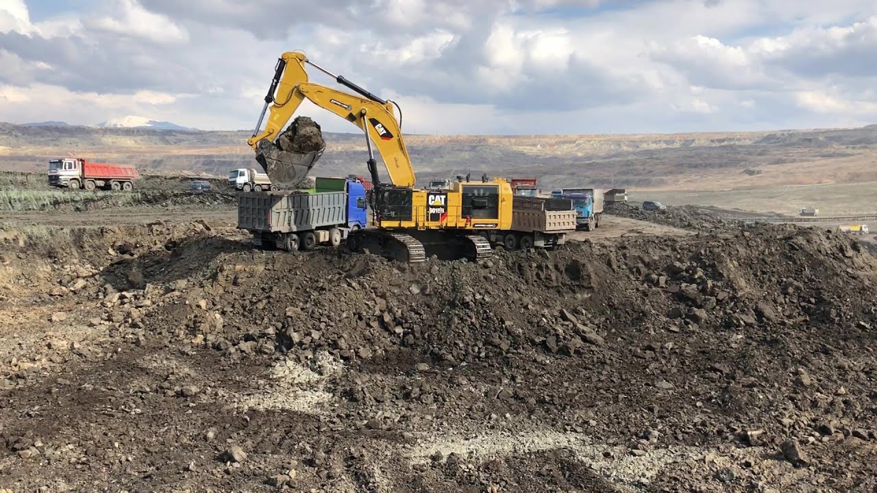 Caterpillar 6015B Excavator Loading Mercedes & MAN Trucks - Sotiriadis Mining Group