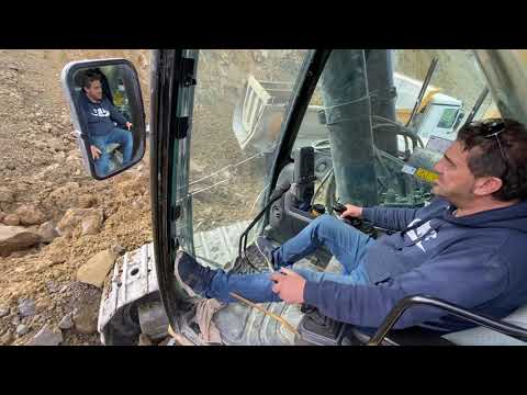 Caterpillar 390D Excavator Loading Trucks - Operator View