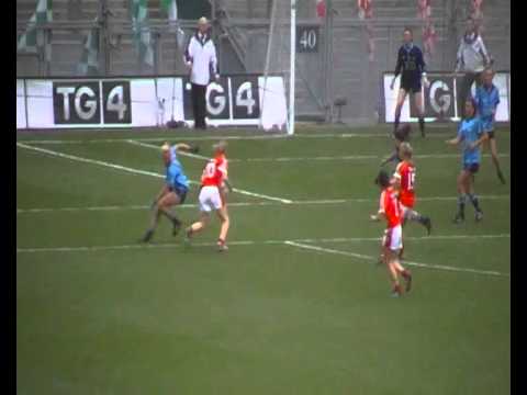 Geraldine O'Flynn of Cork scores a point in the 2014 All-Ireland Ladies Senior Football Final