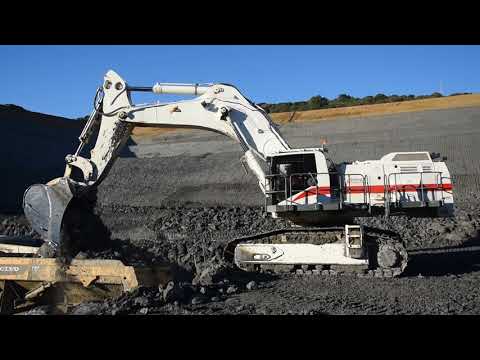 Liebherr R9100 loading Bell B50D and 40 tons ADT
