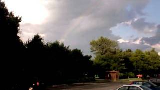 a rainbow from the sun shower