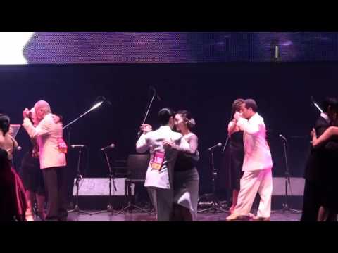  Sebastian Jimenez  and  Juan Carlos Katsuren  are  dancing  to  the  tango  "  Corrientes y Esmeralda  "