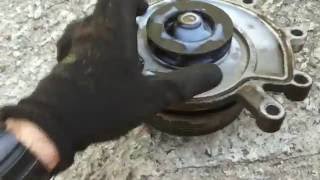 How to replace Water pump on Jeep Commander