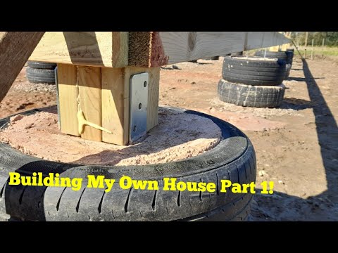 Building my own Offgrid Cabin part 1, Using old Tires as concrete forms for foundations!