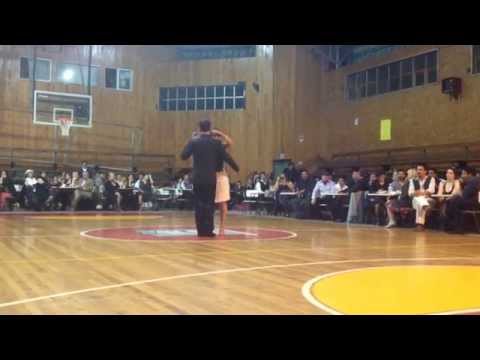  Mamié Sancy  and  Felipe Zarzar  are  dancing  to  a  tango