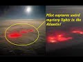 Pilot records mysterious red lights in the middle of the Atlantic on 22 July 2022. What are they?