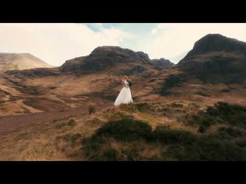 Majestic Scottish mountains witness the wedding. FPV drone video.