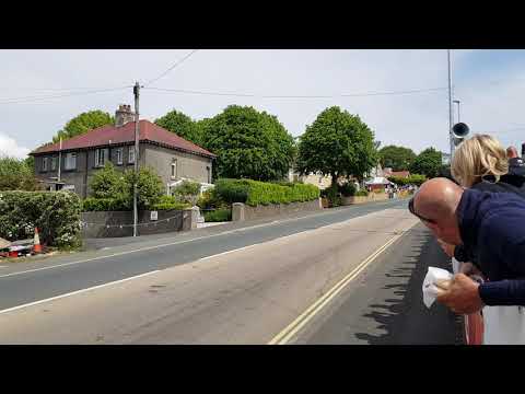 Injured John McGuinness does a "Parade lap" - you know, taking it easy like... on board the works No