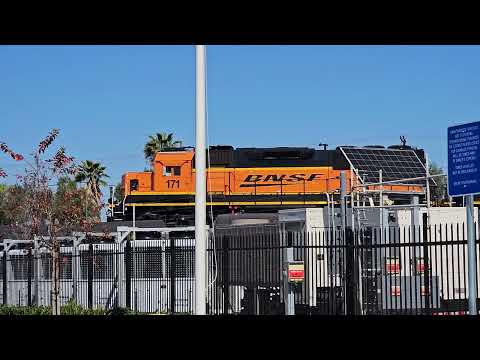 BNSF Switcher, Amtrak Pacific Surfliner and A Caboose at La Mirada, CA  02/19/2023