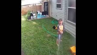 Cover art for Kids Sprays Security Camera with Hose