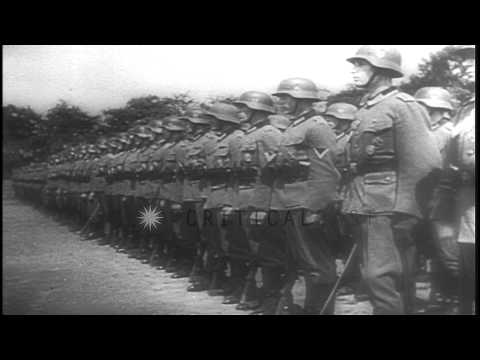 The Commander of the Berlin Guard reviews German soldiers as they march in German...HD Stock Footage