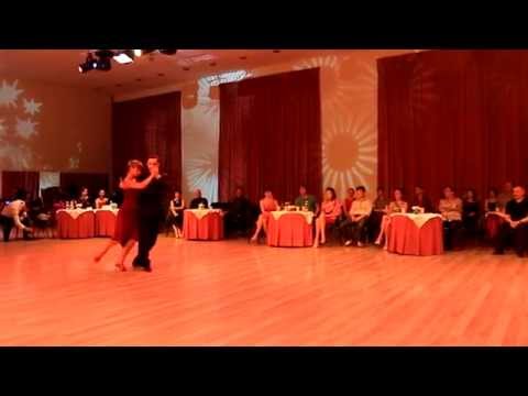  Fausto Carpino  and  Stephanie Fesneau  are  dancing  to  a  vals  at  Kiev International Tango Festival  in  2014