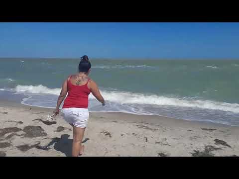 Lupe on the beach for the first time.