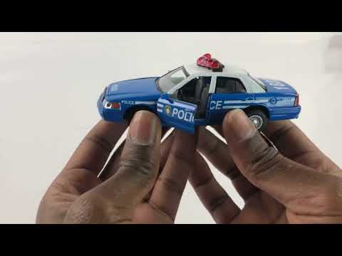 Металлическая машинка Kinsmart 1:42 «Ford Crown Victoria Police Interceptor» KT5342DA инерционная / Голубая