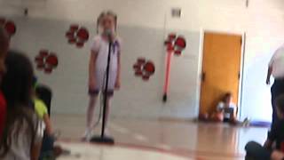 Alexis singing "I will always love you" by Whitney Houston