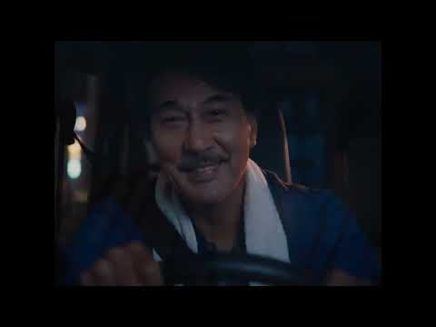 Trailer montage — cassette turns, leaves shimmer, city slides by to a velvet hush