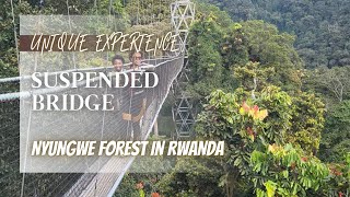 Crossing A Suspended Bridge in Rwanda