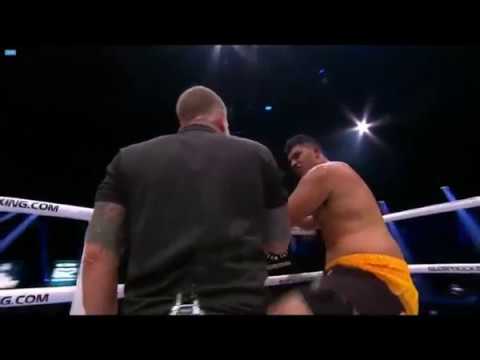 JUNIOR TAFA AND HIS TRAINER YELL AT THE REFEREE