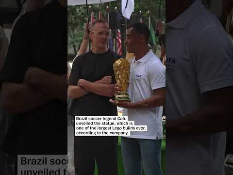 A World Cup trophy made from over one million Legos is built in New York