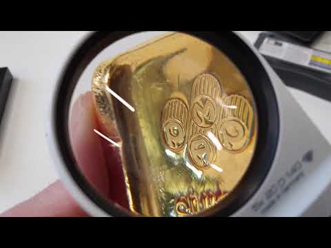 EXTREME CLOSE-UP: 1 kilo Gold Bullion Bar | PAMP SUISSE GOLD BAR