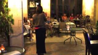 Sandra is singing a Karaoke song on Rhodes